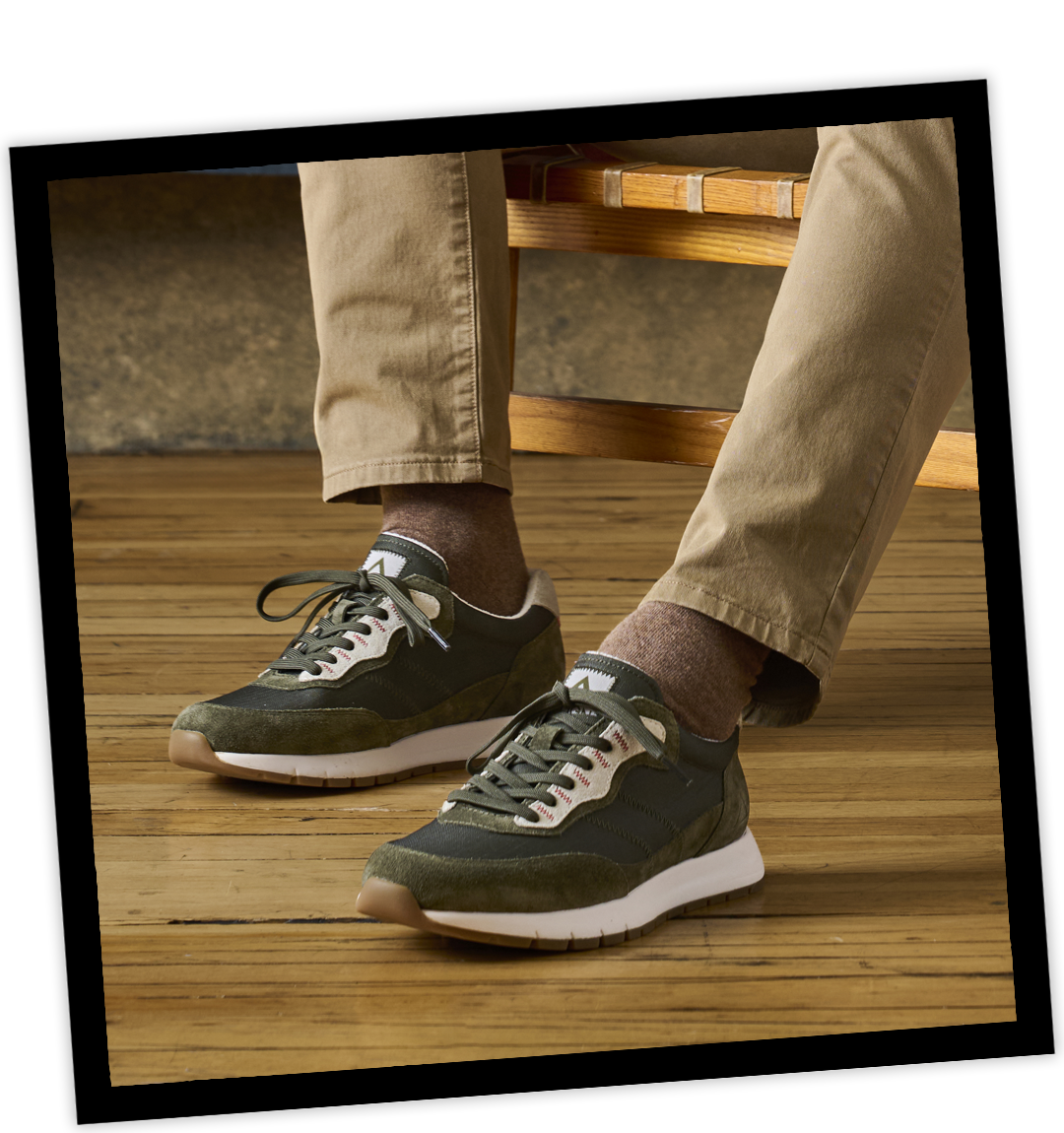 A man wearing the Hasting Sneaker in Khaki Green.