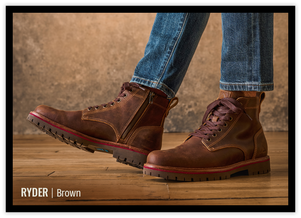 A man wearing the a man Ryder boot in Brown.