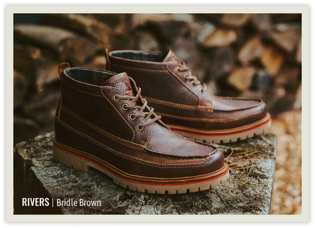 The Rivers boot in bridle brown sitting on a slab of granite.