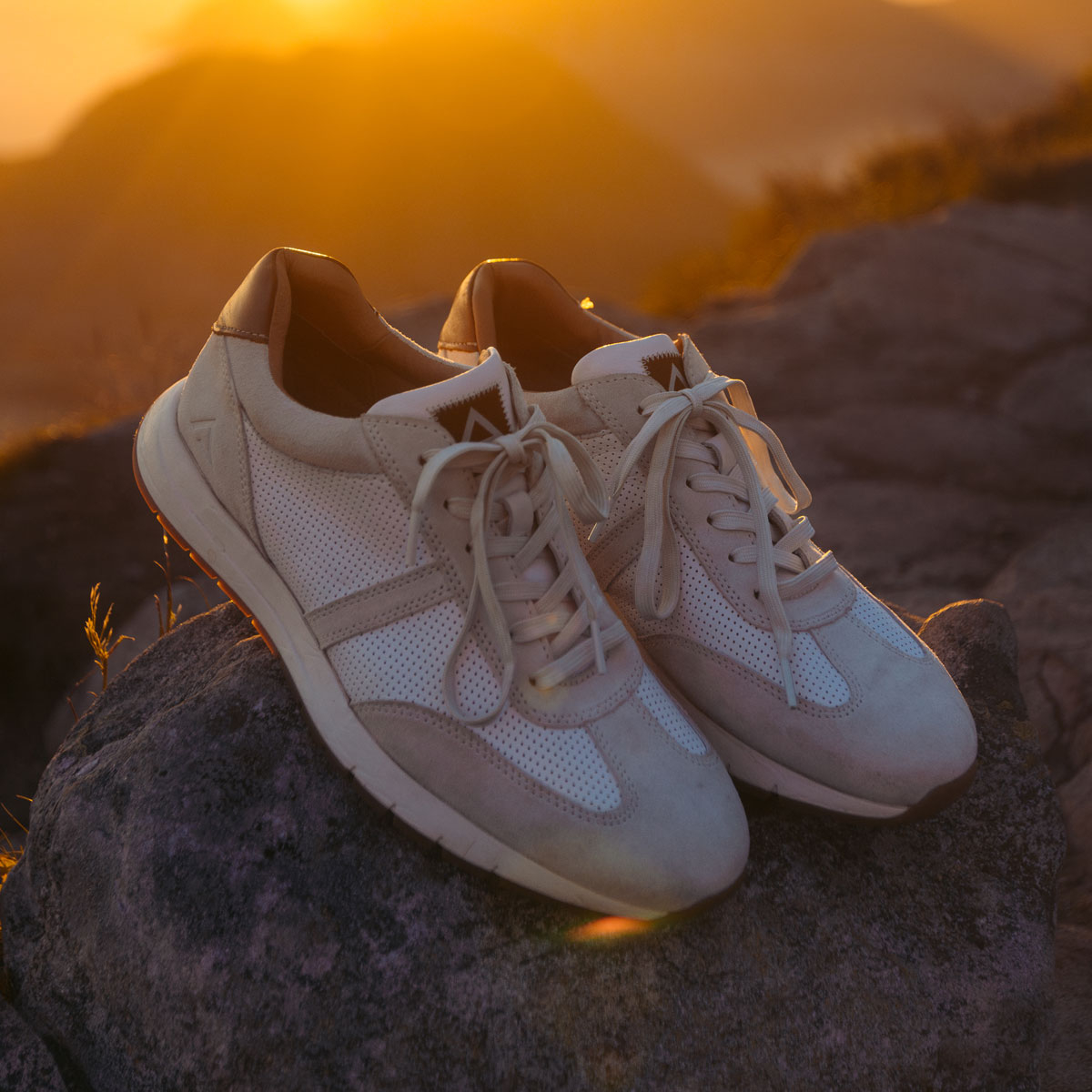 The Hudson Leather Sneakers in white. Shop Hudson.