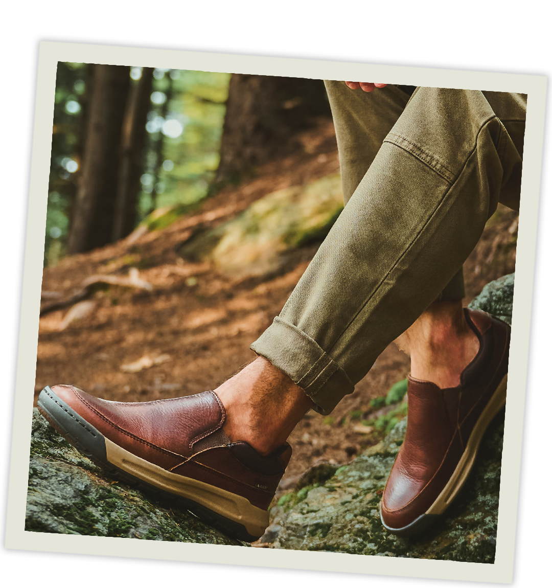 A man wearing the Elliot loafer in Brown.