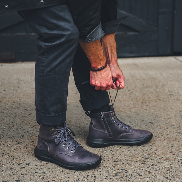 Man wearing Eddy waterproof leather boot in grey. Shop Eddy
