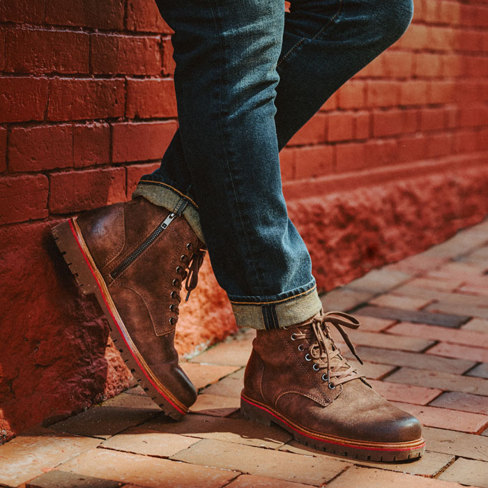 A man wearing the Ryder Waterproof Leather Boots in dark Brown.